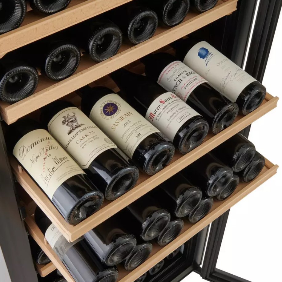 Image of wine bottles on the wine fridge shelves