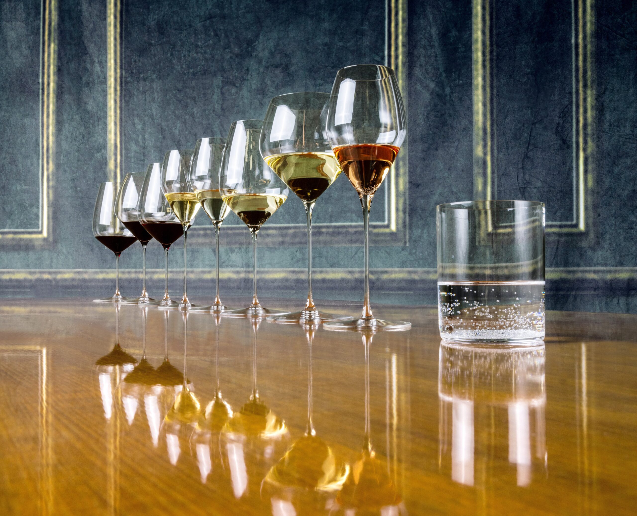 Image of Riedel Veloce Tasting Set wine glasses on a wooden table