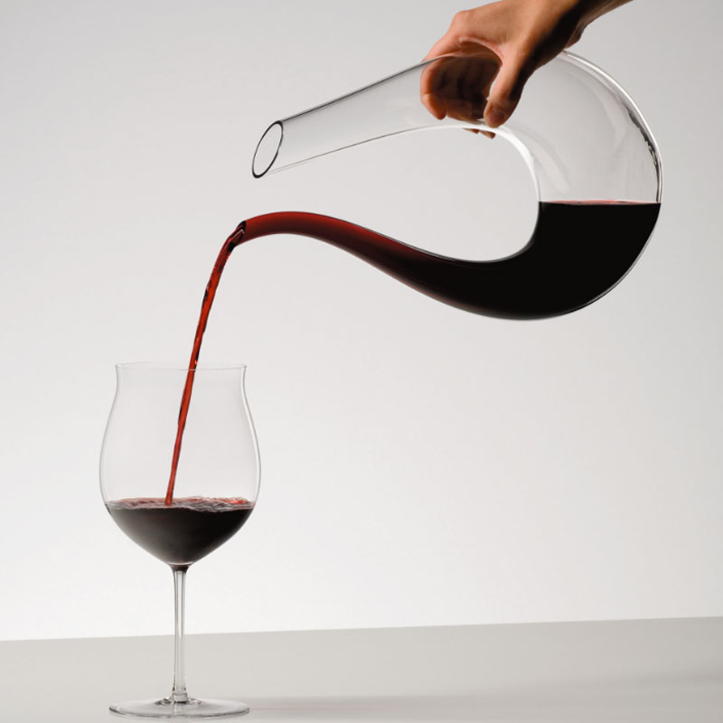 Wine poured in the glass form Riedel Amadeo Crystal Wine Decanter