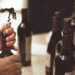 featured image of opening a wine bottle with waiters corkscrew