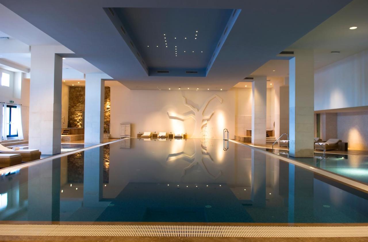 Image shows beautiful indoor pool in Hotel Excelsior