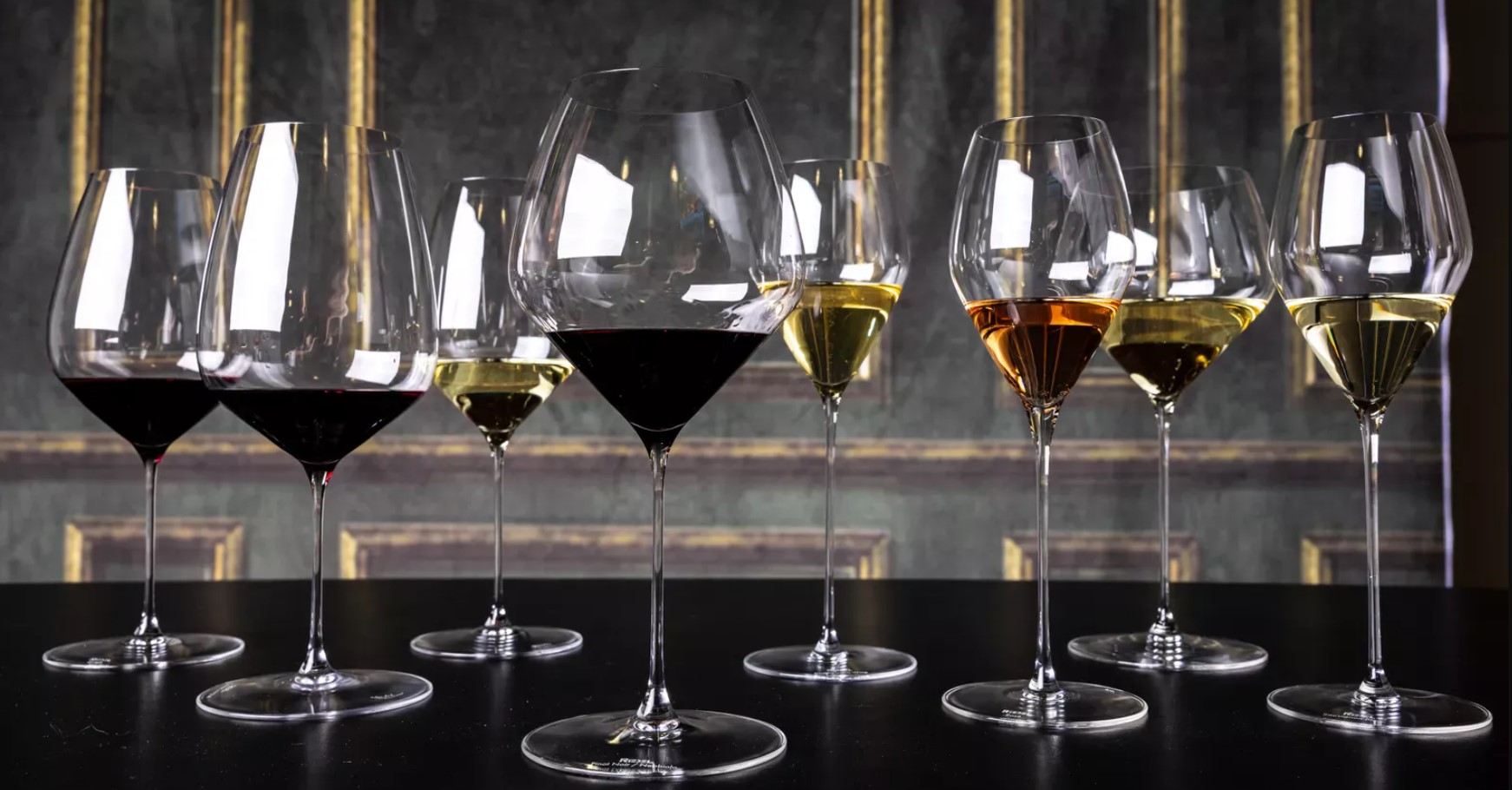Image of various Riedel wine glasses on the table