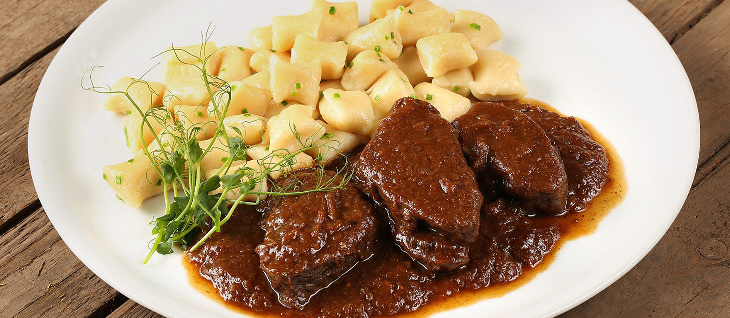 Image of Pašticada, traditional Dalmatian beef stew with gnocchi
